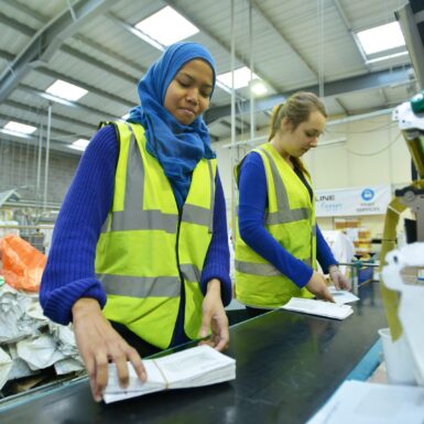 Factory workers on production line