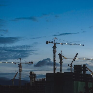 A view of cranes on a construction site